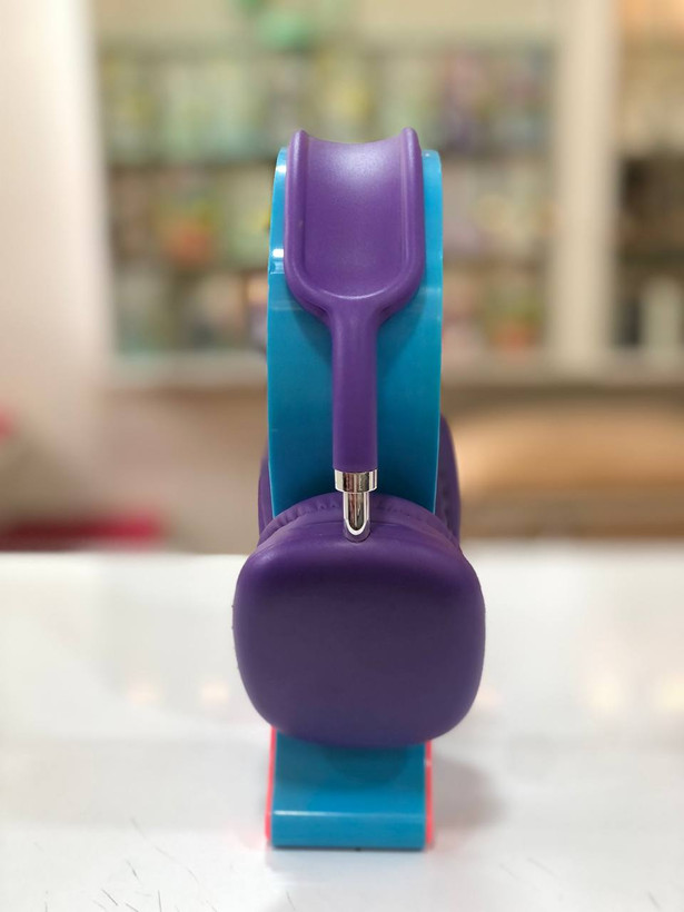هدست بلوتوثی MZ-09 در رنگ بنفش، طراحی زیبا با گوشپوشهای نرم و راحت.