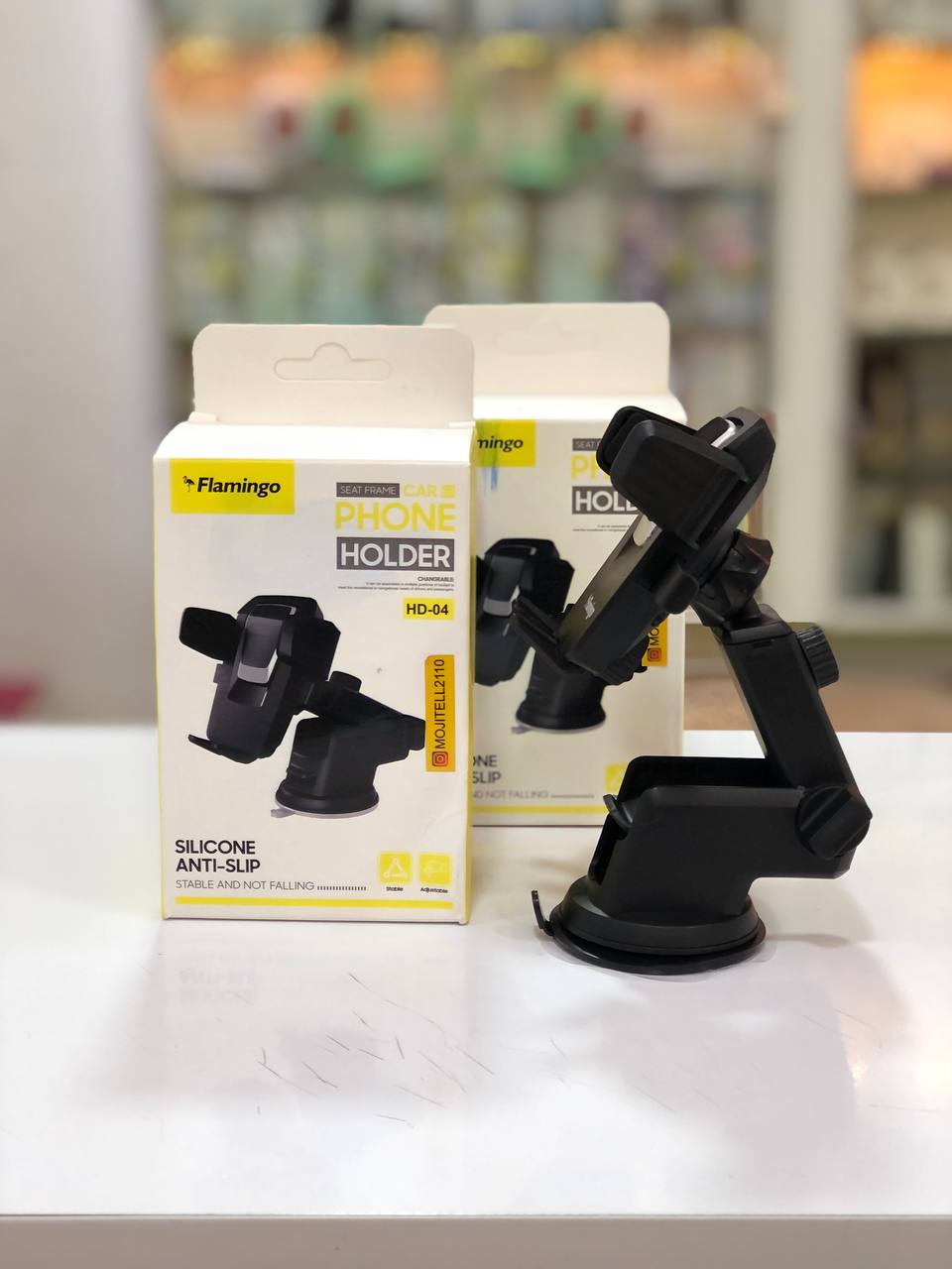 پایه نگهدارنده گوشی گیره‌ای Flamingo HD-04 روی میز کار