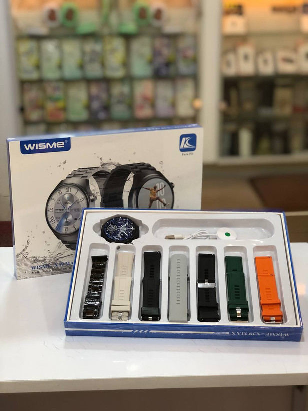 نمای بستهبندی ساعت Wisme X39 Max شامل ۷ بند و شارژر مغناطیسی – فروشگاه مُجیتِل