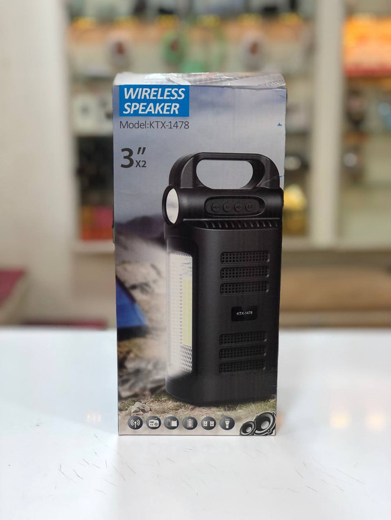 اسپیکر بلوتوثی قابل حمل KTX-1478 دارای چراغ قوه و پنل خورشیدی